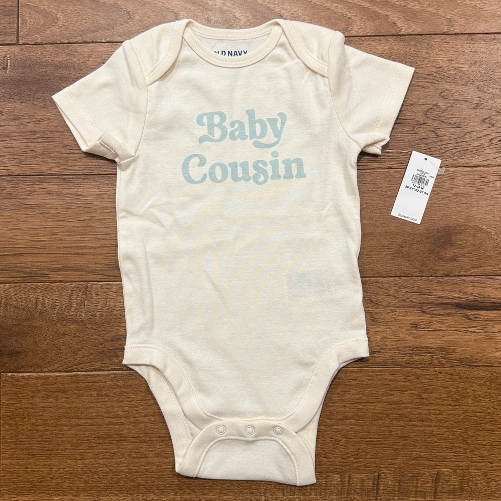 Old Navy Short-Sleeve Baby Bodysuit  
- Baby Cousin - Size 12-18 Months